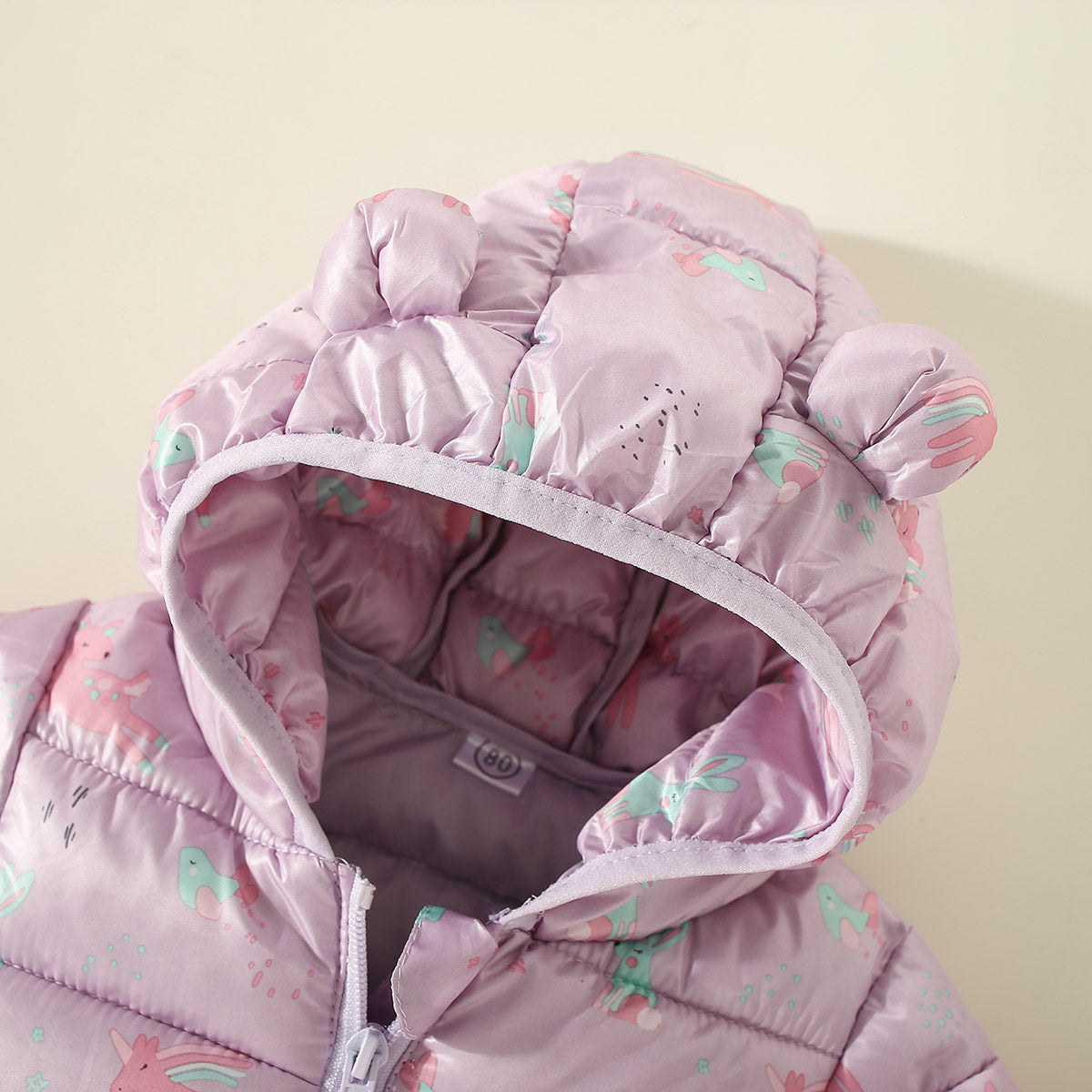Mayoreo Abrigo acolchado de algodón con cremallera y capucha con estampado de unicornio de dibujos animados para niña pequeña 9-12 M Multicolor