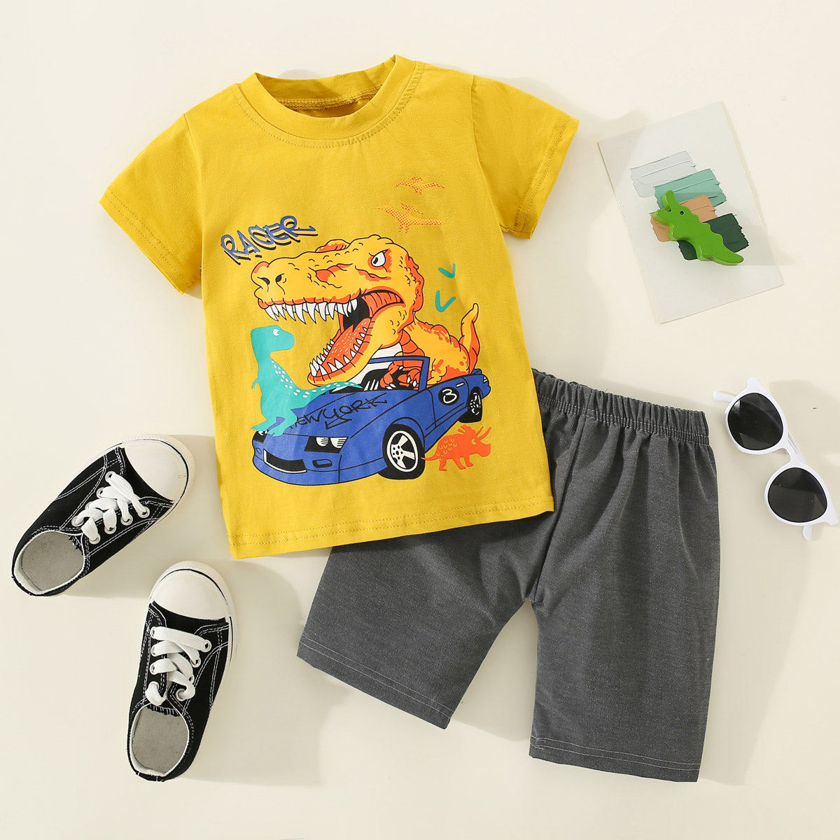 Mayoreo Camiseta con estampado de dinosaurio y vehículo de algodón puro para niños pequeños de 2 piezas y pantalones de color sólido Amarillo 3-4 Y