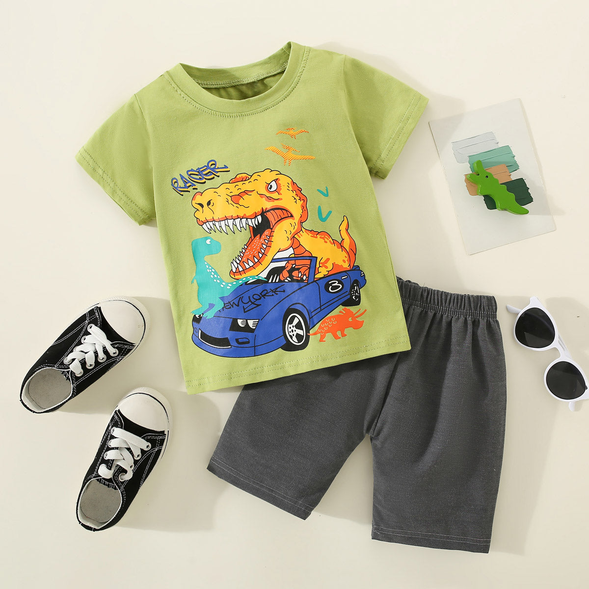 Mayoreo Camiseta con estampado de dinosaurio y vehículo de algodón puro para niños pequeños de 2 piezas y pantalones de color sólido gris 18-24 M