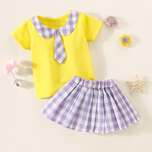 Mayoreo Camiseta con decoración de pajarita y solapa a cuadros para niña pequeña de 2 piezas y falda plisada a cuadros Amarillo 9-12 M