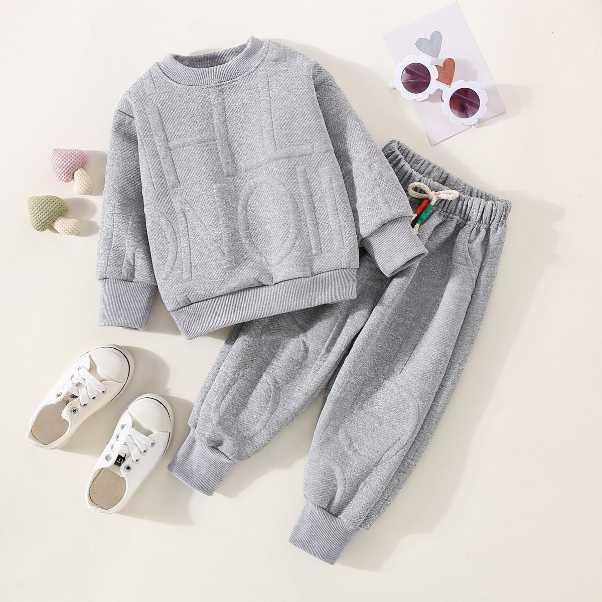 Mayoreo Camiseta de manga larga y pantalones pitillo con estampado de letras texturizadas de color sólido para niños pequeños de 2 piezas gris 3-4 Y